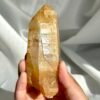 156f54fe84cc8c69b63dbb5bca1806e0 Golden Mineral-Skinned Himalayan Handheld Crystal 12K