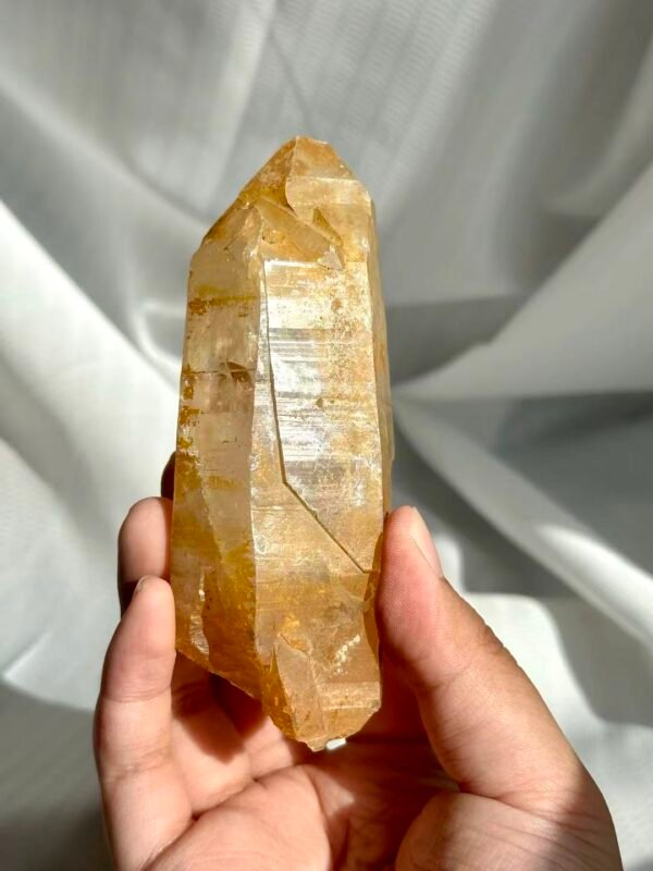 156f54fe84cc8c69b63dbb5bca1806e0 Golden Mineral-Skinned Himalayan Handheld Crystal 12K
